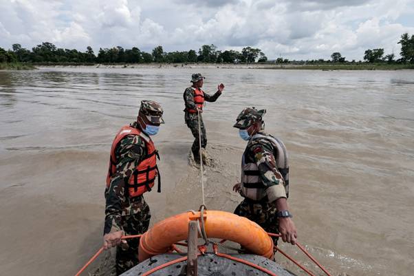 Nepal races to rescue workers trapped in tunnels