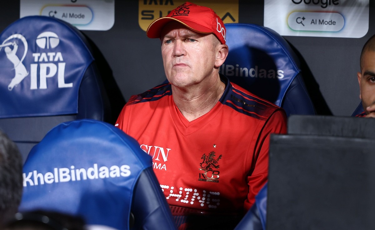 RCB coach Andy Flower fined for code breach during tense MI clash